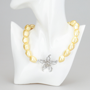 Perle artificiale aurii cu accesoriu central